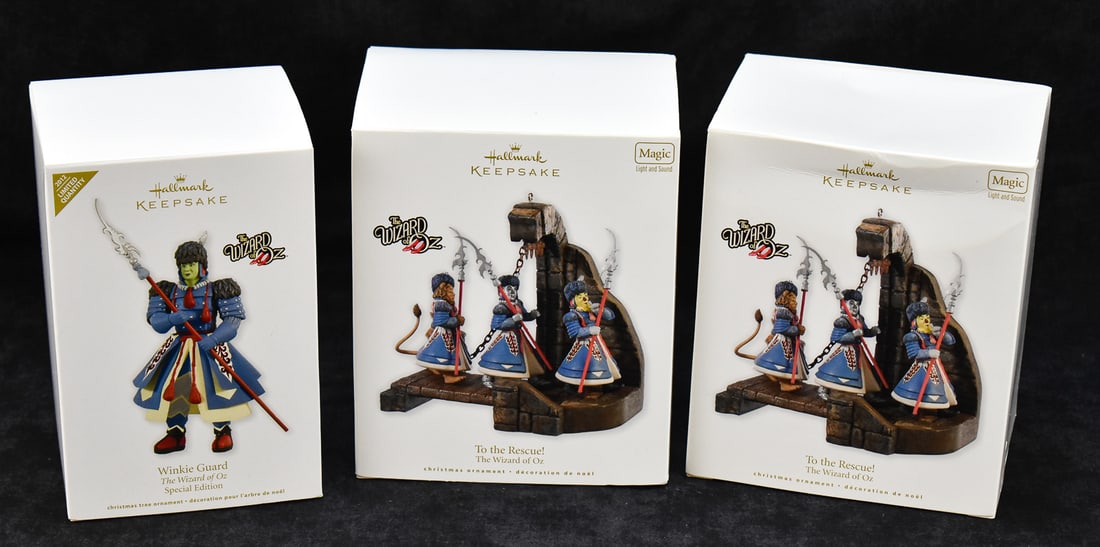 HALLMARK KEEPSAKES WIZARD OF OZ CHRISTMAS ORNAMENT COLLECTION: 'WINKIE GUARD' AND 'TO THE RESCUE!': This lot includes the following Hallmark Keepsakes from the Wizard of Oz Christmas ornament series with original boxes: 2012 special edition "Winkie Guard" designed by Nello Williams and two 2010 "To 
