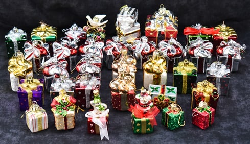 COLLECTION OF GLASS GIFT BOX CHRISTMAS ORNAMENTS