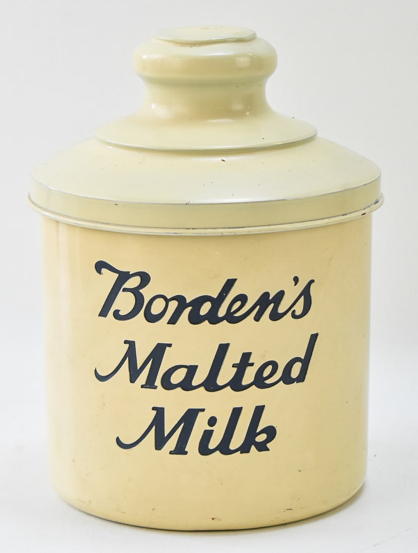 BORDEN'S MALTED MILK CANISTER: 1950's Borden's Malted Milk aluminum lidded canister, measuring 8.5" H x 6" W x 6" D.