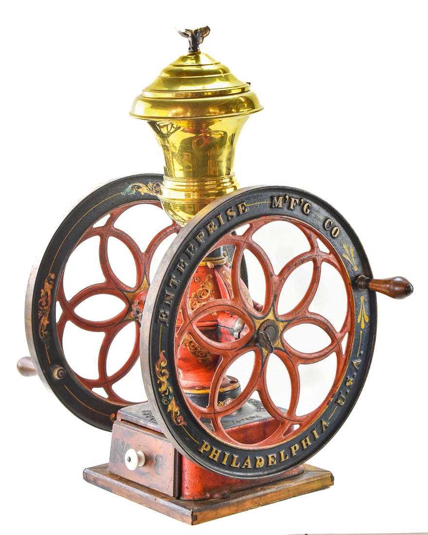 ENTERPRISE MFG. CO. CAST IRON COFFEE MILL No. 8: An Enterprise Manufacturing Company cast iron counter style coffee mill No. 8 with an eagle finial, last patented 1898. The mill measures 28" heigh, 23" wide, and 17" deep.