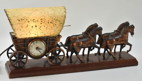 UNITED COVERED WAGON LAMP WITH CLOCK, CIRCA 1950s