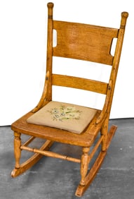 VICTORIAN CHILD'S OAK ROCKER WITH NEEDLEPOINT SEAT