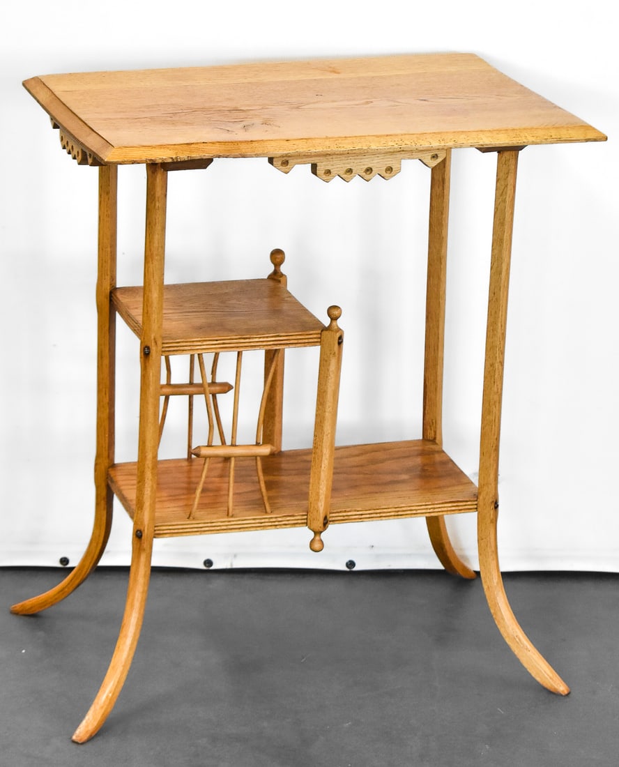 VICTORIAN EASTLAKE TWO TIER PARLOR TABLE: An Eastlake two-tier bottom parlor table, circa turn of the 19th Century. The table measures 30" H x 25" W x 16.5" D.