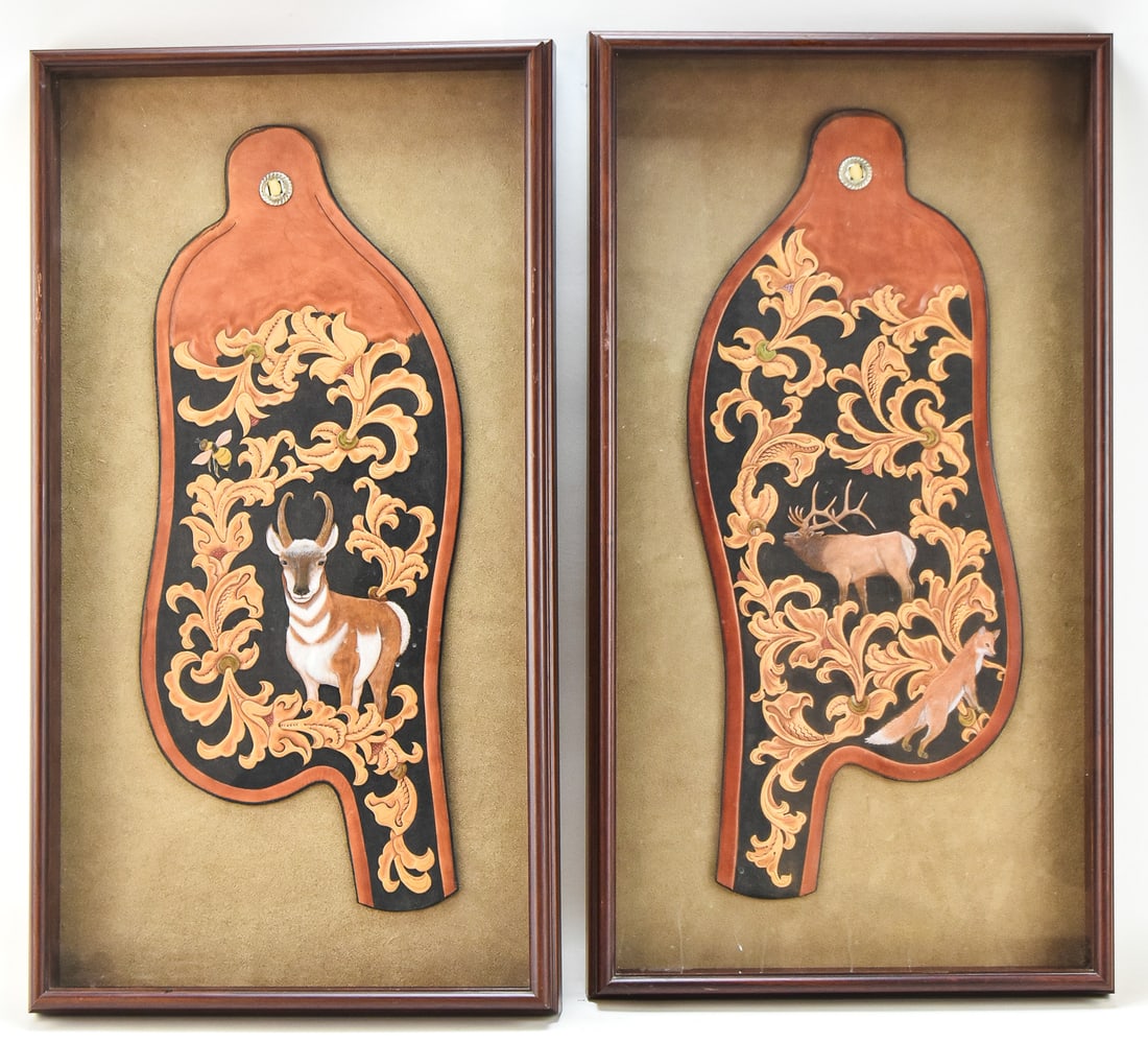 FRAMED CUSTOM TOOLED LEATHER CHAPS - WESTERN AMERICAN WILDLIFE: Framed custom hand-tooled leather pair of chaps with one chap featuring a pronghorn/bumblebee and the other features an elk/red fox. Measures 28.5" H x 15.5" W.