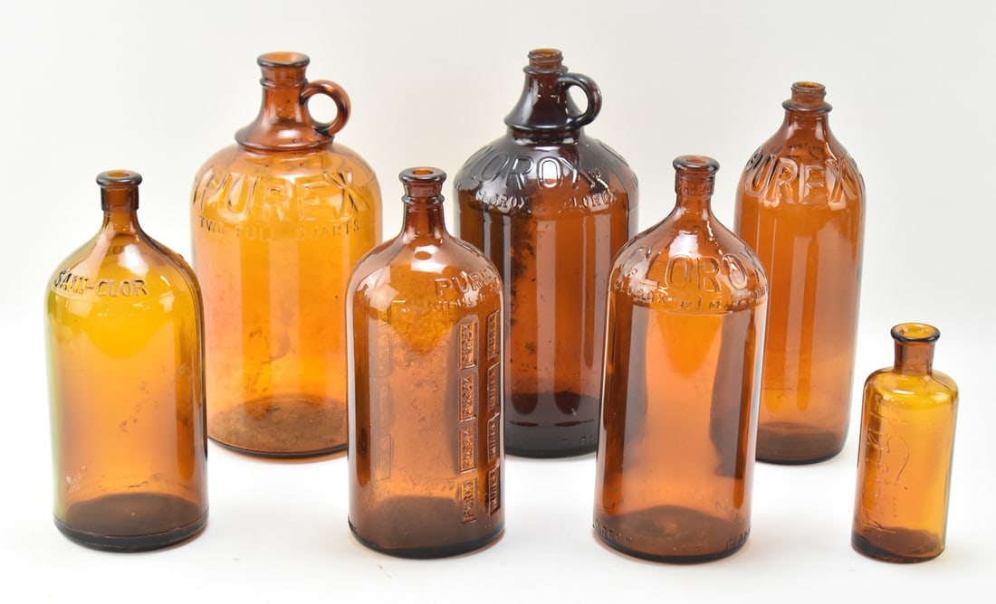 ASSORTED COLLECTION OF PYREX & CLOROX BROWN GLASS JUGS: Assorted collection of seven Pyrex & Clorox brown glass jugs. Largest is 10.5"H X 5" diameter.