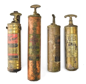 COLLECTION OF FOUR ANTIQUE VEHICLE FIRE EXTINGUISHERS
