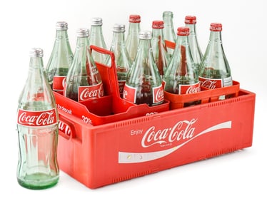 12 VINTAGE COCA-COLA ONE-QUART BOTTLES: CROOKSTON, MINNESOTA AND ATLANTA, GEORGIA BOTTLING