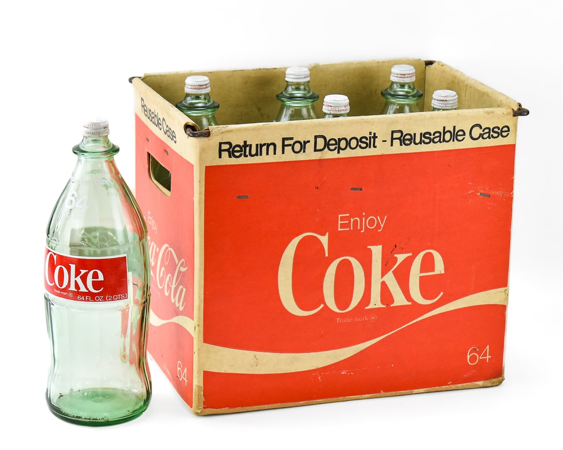 VINTAGE COCA-COLA TWO-QUART BOTTLES WITH CARRYING CASE: ATLANTA BOTTLING: This lot includes six Coca-Cola 2-quart bottles (Atlanta, Georgia) within a metal-lined carrying case, circa late 20th century. The lot measures 13" heigh, 15.5" wide, and 10.5" deep.