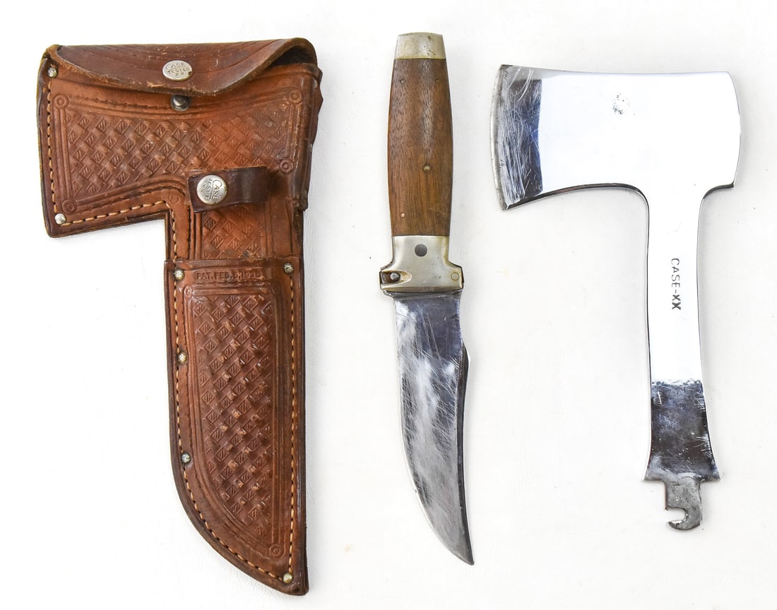 1935 PTND. CASE TESTED KNIFE/HATCHET COMBO: A 1935 patented "Case Tested" Case knife/hatchet combo with interchangeable hatchet head and blade, and a fold-out ruler lock. The blades include a fitted embossed basket weave pattern sheath and wood