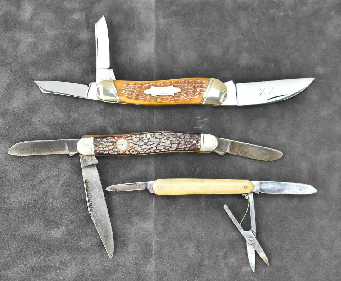 THREE CASE & BOKER MULTI-BLADE FOLDING KNIVES: Three pocket folder multi-blades, including: a Case 6355 Seahorse Whittler made in 1992, a Boker Solingen Germany tree-marked folder with scissors and bone handle scales, and a Boker USA 8573 Stockman