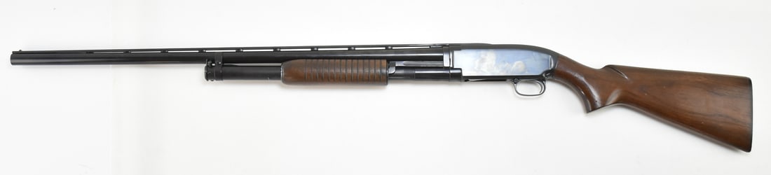 1952 WINCHESTER MODEL 12 SHOTGUN: A 1952 Winchester Model 12 shotgun chambered in 2 3/4 inch 12 gauge, with a 30 inch fixed mod choke barrel and the dog-leg action bar. At the time of manufacture, the shotgun was professionally upgrad