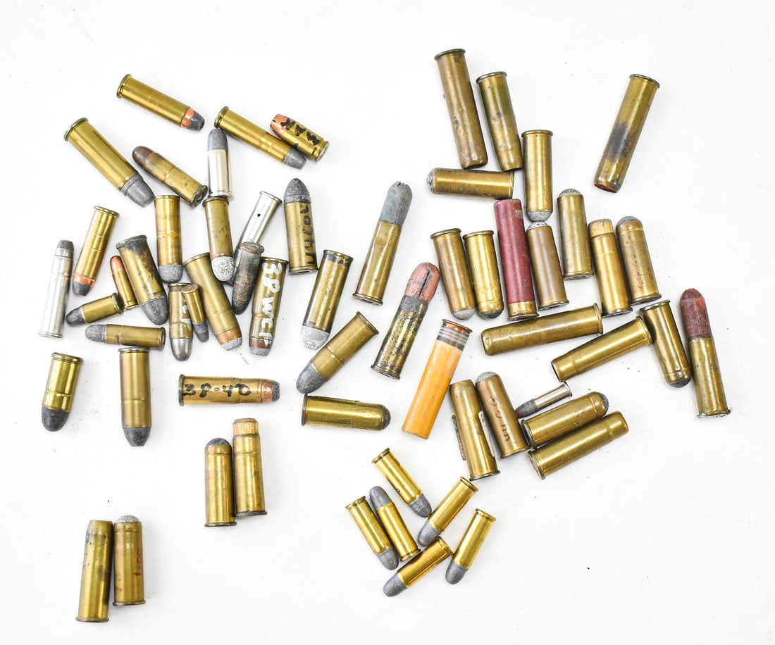 COLLECTION OF ANTIQUE & VINTAGE COWBOY-ACTION, REVOLVER, & RIFLE CARTRIDGES & SHOTSHELLS: A collection of antique to vintage defunct revolver and rifle cartridges, most of which are from the era of western and cowboy-action shooting, for collectible and historical preservation purposes. Th