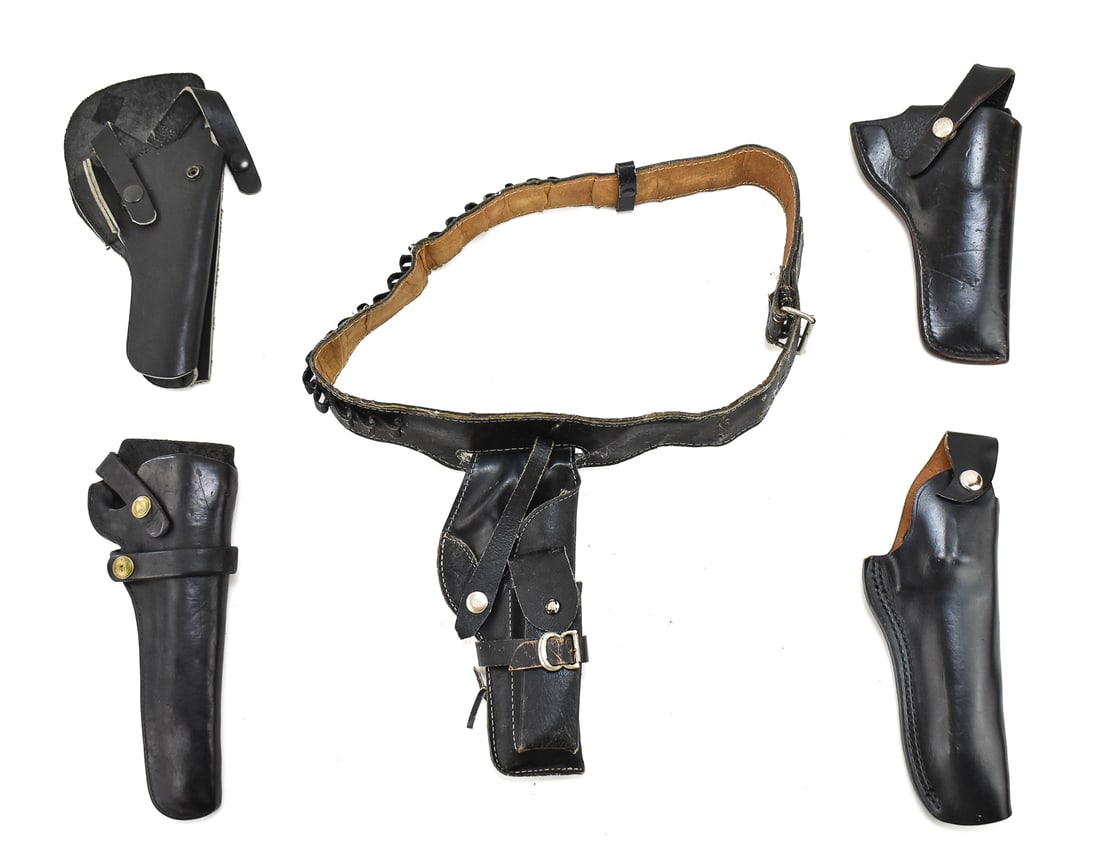 COLLECTION OF VINTAGE BLACK LEATHER REVOLVER HOLSTERS: A collection of vintage black leather revolver holsters, including: one Hunter 1100X52 for a 6 inch barrel, one Kirkpatrick M6 holster for a 6 inch barrel, one Bucheimer BPM-9 holster for a 4 inch bar