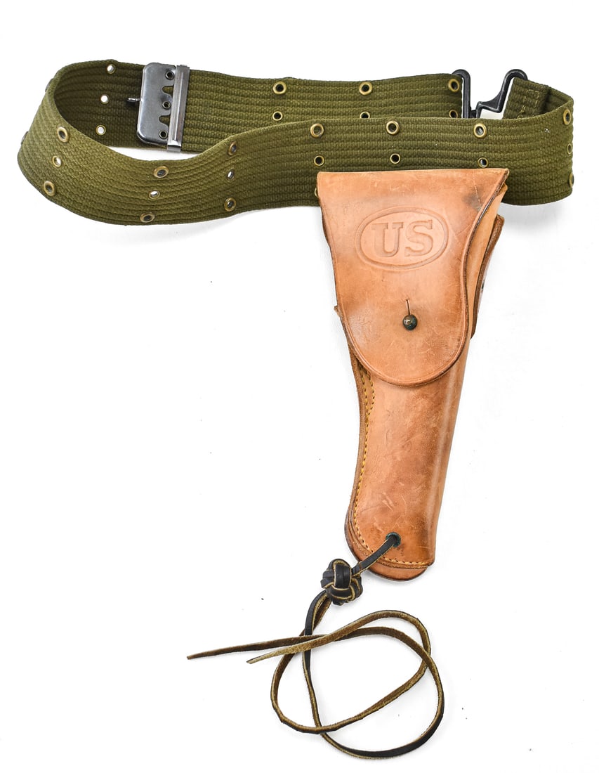 US WWII-ERA M1916 HOLSTER & BELT FOR THE M1911A1: An original US WWII-era M1916 holster and belt, for the M1911A1 pistol. The holster was made and marked by Milwaukee Saddlery Co. in 1944.