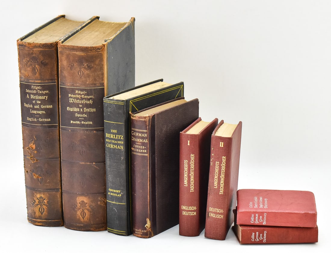 COLLECTION OF ENGLISH-GERMAN DICTIONARIES, TRANSLATION, & GRAMMAR BOOKS: This lot includes: a pair of c. 1914 and c. 1909 "A Dictionary of the English and German Languages" in English-German and German-English, respectively, by Flugel-Schmidt-Tanger; a copy of "The Berlitz