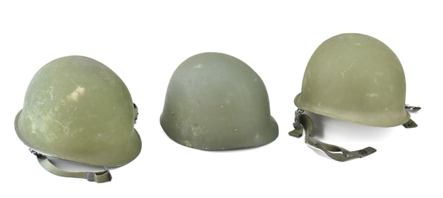 FOUR M1 HELMETS