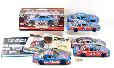 COLLECTION OF RICHARD PETTY 1:18 DIECAST CARS & BOOKS