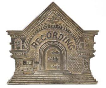 MAGIC INTERNATIONAL NOVELTY CAST IRON DIME BANK - THE NATIONAL RECORD BANK