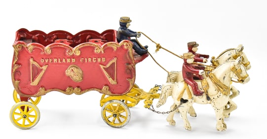 KENTON HARDWARE OVERLAND CIRCUS CAST IRON WAGON WITH THREE RIDERS