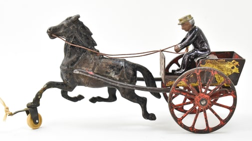 IVES (ATTR.) CAST IRON SULKY TOY