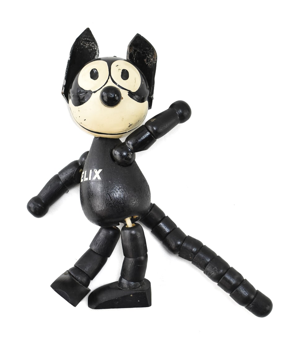 1920s FELIX THE CAT WOODEN TOY: A circa mid-1920s Felix the Cat poseable wooden toy with original foot label, measuring 9" H x 6" W x 3" D.