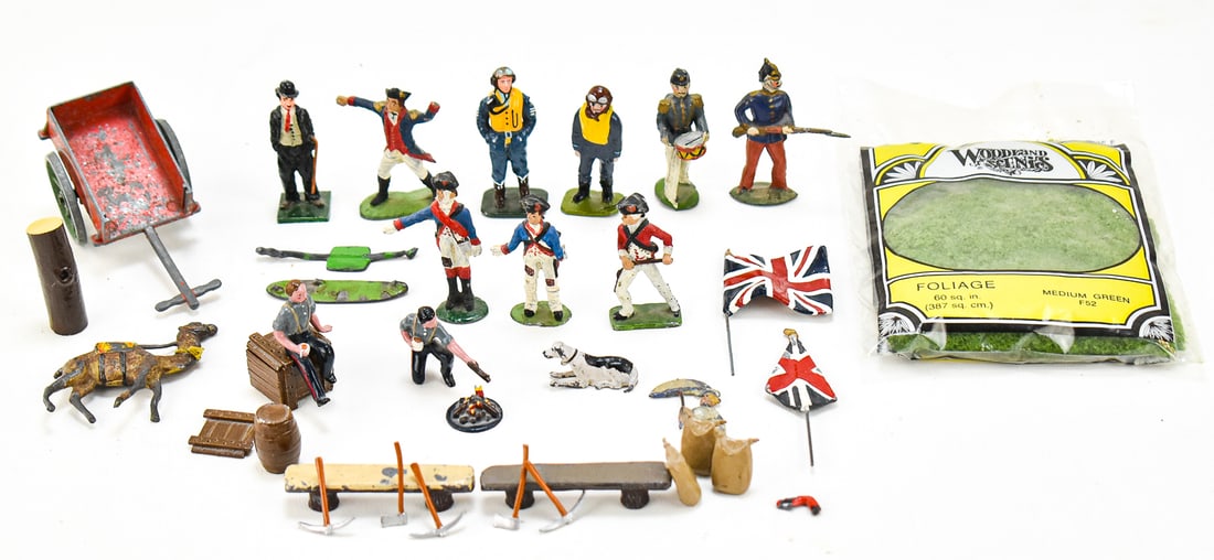 ASSORTMENT OF VINTAGE TOY FIGURINES: CHARLIE CHAPLIN, GERRY FORD, REVOLUTIONARY WAR, AND MORE: This lot includes the following toy figurines: Charlie Chaplin, two Gerry Ford limited edition Battle of Britain fighter pilots, four Revolutionary War soldiers, and more.