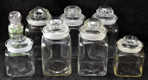 EIGHT GLASS VINTAGE LIDDED CANDY JARS