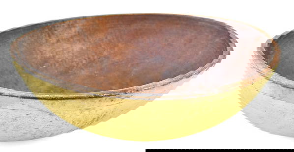 ANTIQUE PRIMITIVE WOODEN MIXING BOWL: An antique primitive wooden mixing bowl with a painted exterior. The bowl measures 5.5" H x 16.5" W x 16.5" D.