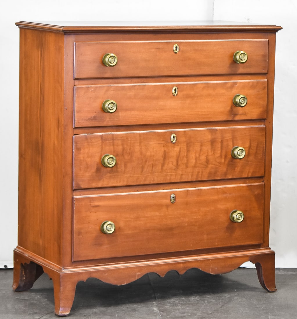 CIRCA 1790 CHEST OF DRAWERS: A circa late 1700s cherry chest with four drawers, measuring 45" H x 39" W x 19" D.