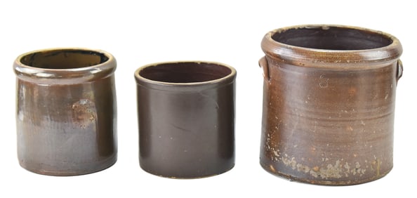 THREE ANTIQUE CHOCOLATE GLAZE STONEWARE CROCKS