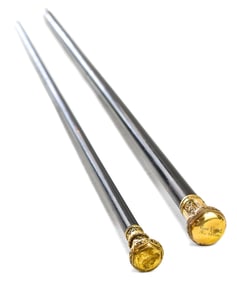 TWO VICTORIAN EBONIZED WALKING CANES WITH BRASS POMMELS