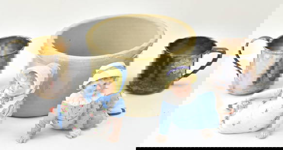 ASSORTED SILVER, STONEWARE, & MORE: This lot includes two bisque porcelain figurines which may be German, one stoneware cylindrical jar, one silverplate cup, an one sterling silver cup weighing 78.6 grams. The bisque porcelain figurines