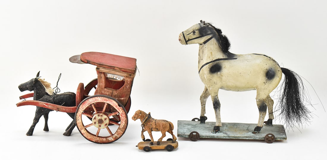 THREE VICTORIAN CHILDREN'S HORSE-DRAWN PULL TOYS: Includes three hand-painted Victorian children's horse-drawn pull toys, circa turn of the 19th century. The largest pull toy is marked "Germany". The toys measure from 3" to 9.5" H