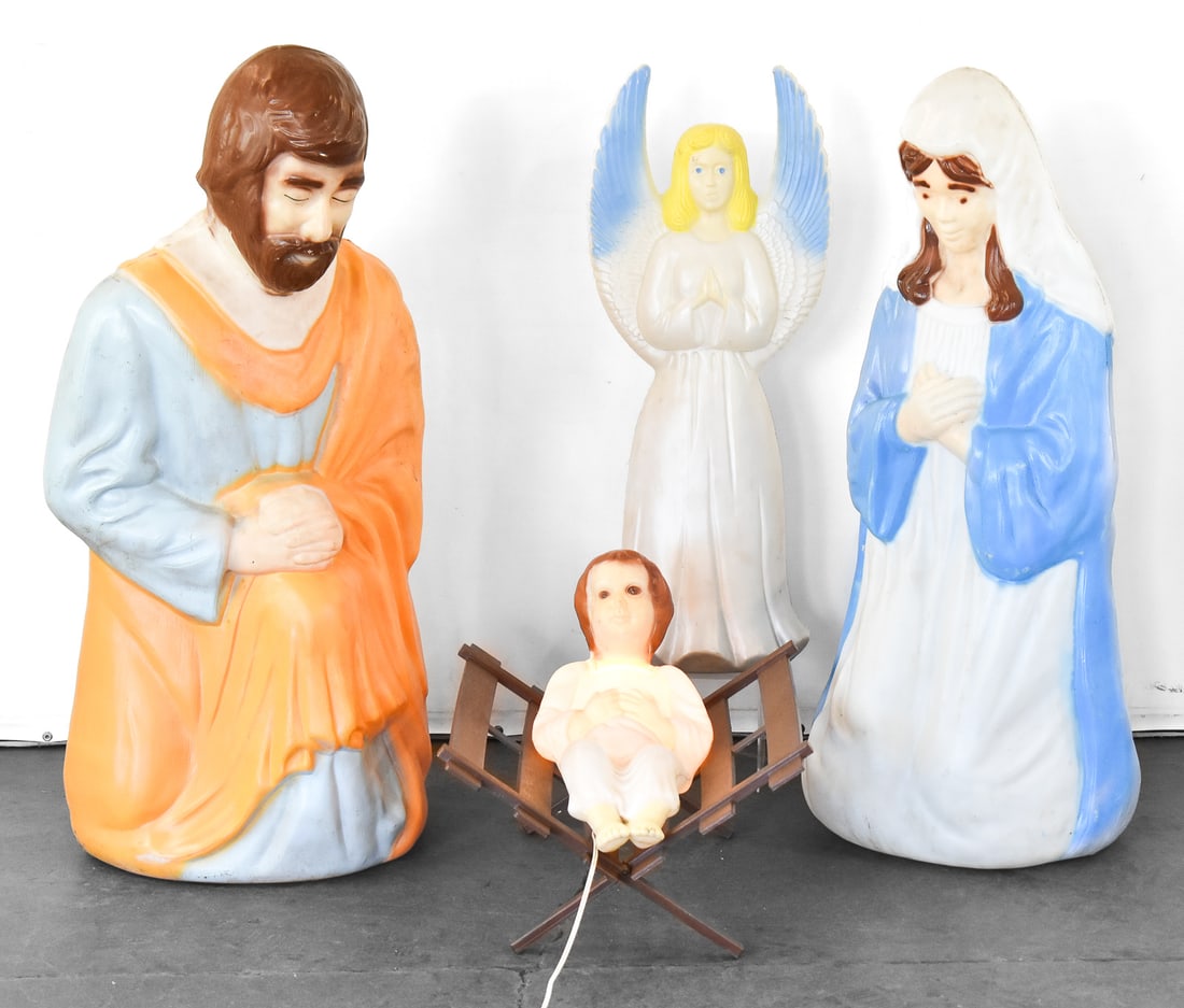 EMPIRE & UNION PRODUCTS NATIVITY BLOW MOLD SET: An Empire Plastics Nativity blow mold set including Joseph, Mary, and Baby Jesus in a manger, with a Union Products Angel blow mold. The Joseph blow mold measures 40" H x 18" W x 15" D.
