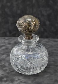 ST. JUDE CHARITY LOT: ANTIQUE CUT-CRYSTAL PERFUME BOTTLE OR DECANTER WITH SILVER STOPPER