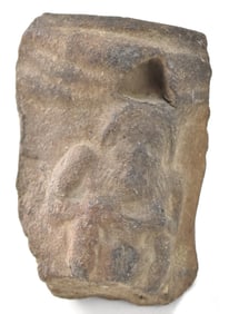 SEATED FIGURE RELIEF FRAGMENT CARVED FROM VOLCANIC STONE