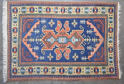 EARLY 20TH CENTURY CAUCASIAN WOOL AREA RUG
