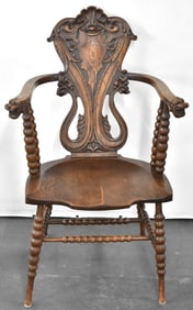 CIRCA 1900 CARVED OAK ARMCHAIR