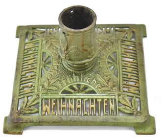 GERMAN 'FR?–HLICHE WEIHNACHTEN' CAST IRON CHRISTMAS TREE STAND