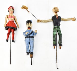 THREE EUROPEAN FOLK ART ARTICULATED MECHANICAL FIGURES: POLICEMAN, CARTOON CHARACTER, FLAPPER