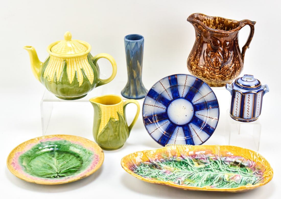ASSORTED PITCHERS & SERVING WARE: Includes a Gaudy Welsh flow blue "Wagon Wheel" lidded sugar bowl and plate, Shawnee Pottery "Corn King" teapot and creamer measuring 7" H x 9" W x 5.5" D, an Etruscan majolica serving dish and platter