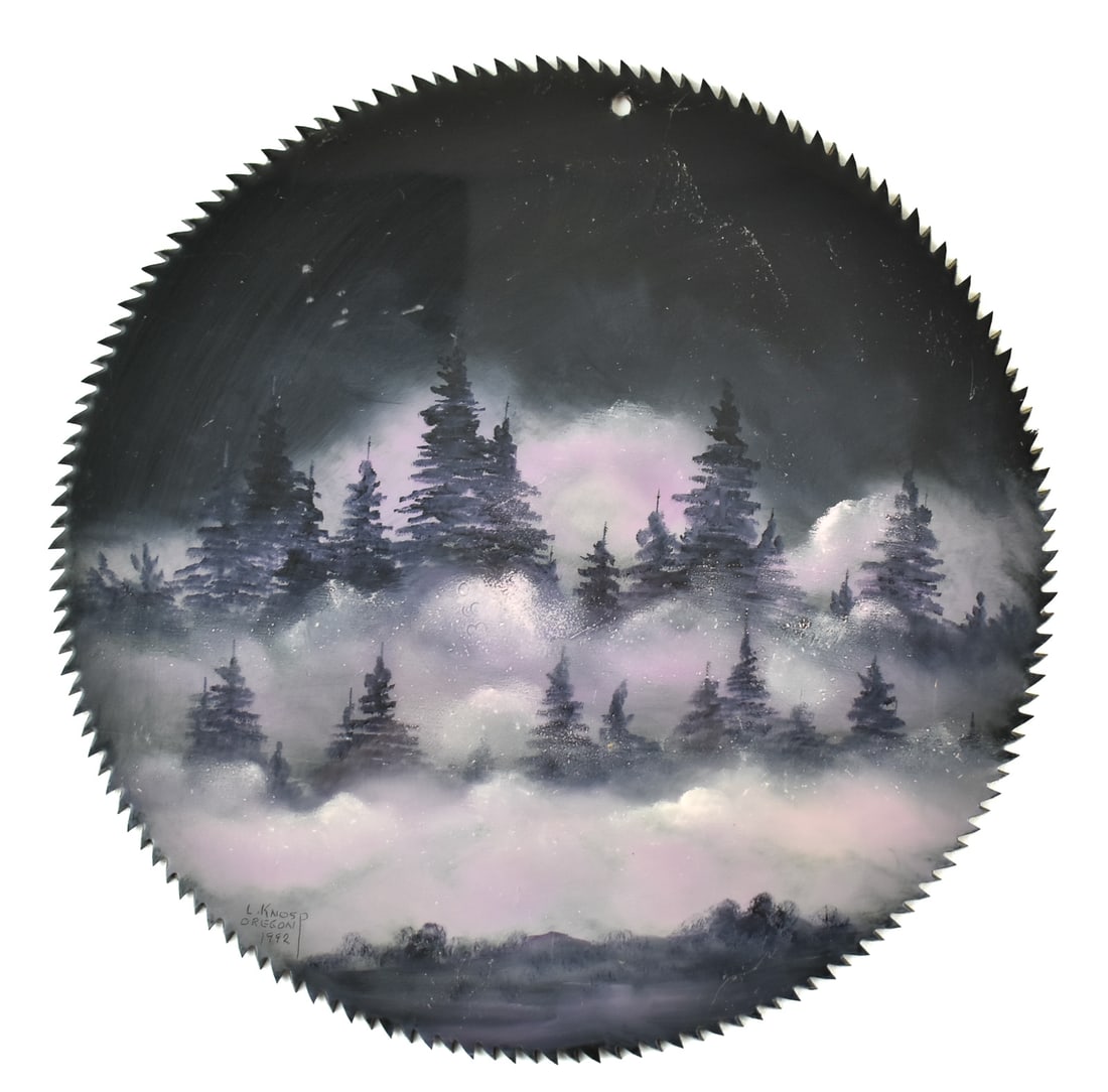 1992 LEON KNOSP SIGNED OIL PAINTING ON A SAW BLADE: A Leon Knosp-Oregon signed oil painting on a saw blade dated 1992. The item measures 13.5" H, 13.5" W, 1" D.