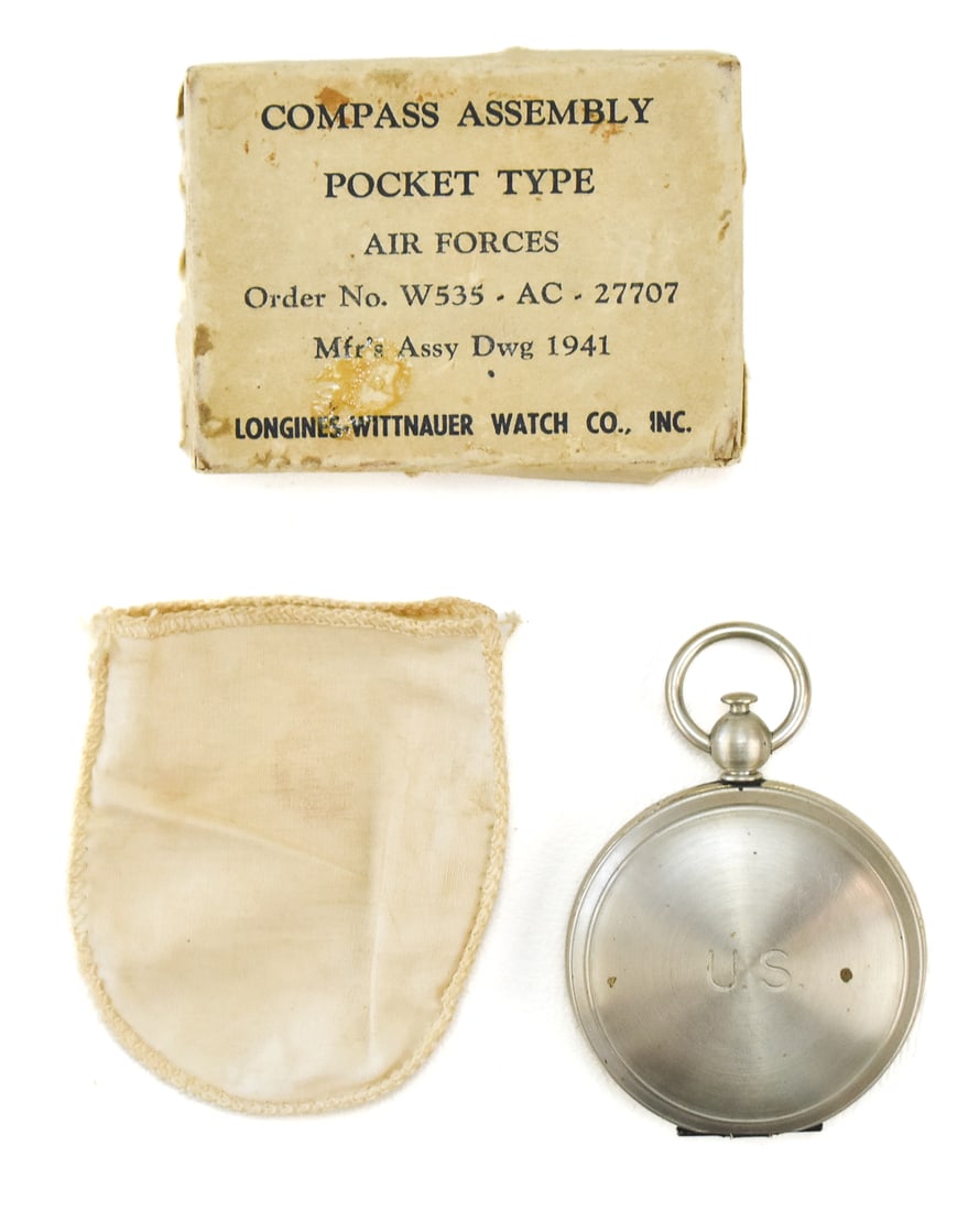 LONGINES-WITTNAUER AIR FORCES POCKET TYPE COMPASS ASSEMBLY: A Longines-Wittnauer manufactured WWII Air Forces Pocket Type Compass Assembly. Complete with the original cloth cover and original box. The compass box measures 2" H x 2.75" W x 0.75" D.