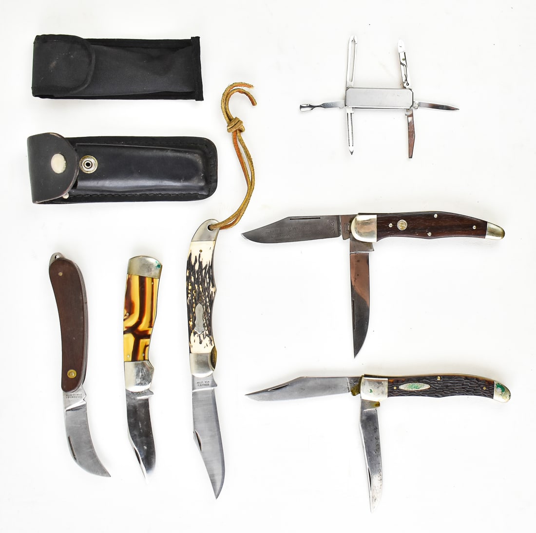 COLLECTION OF VINTAGE POCKET FOLDER KNIFES & MULTI-TOOLS: A collection of vintage pocket folders and multi-tools, including: one Boker Tree Brand Classic 2020 double folder, one Schrade Walden 127 UH, one Western (Boulder, CO.) 062 double blade, one Tramonti