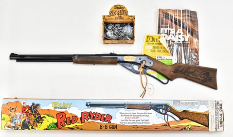 VINTAGE 1980S DAISY RED RYDER BB GUN WITH STRONGBOX OF QUICKSILVER BBS