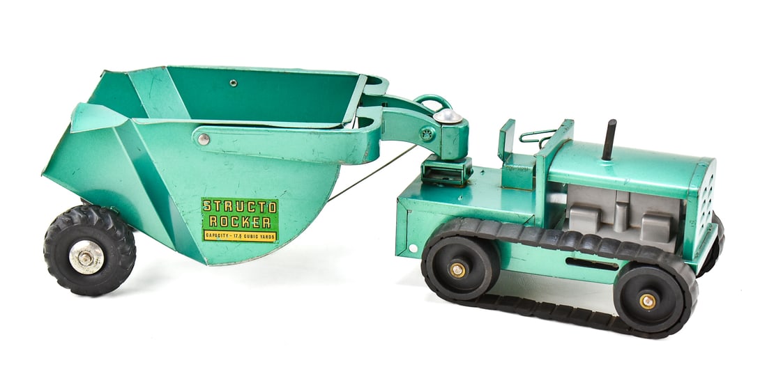 STRUCTO TOYS ROCKER EARTH MOVER: A 1950s Structo Toys Rocker teal colored 17.5 cubic yard earth mover, measuring 5" H x 20" W x 6" D.