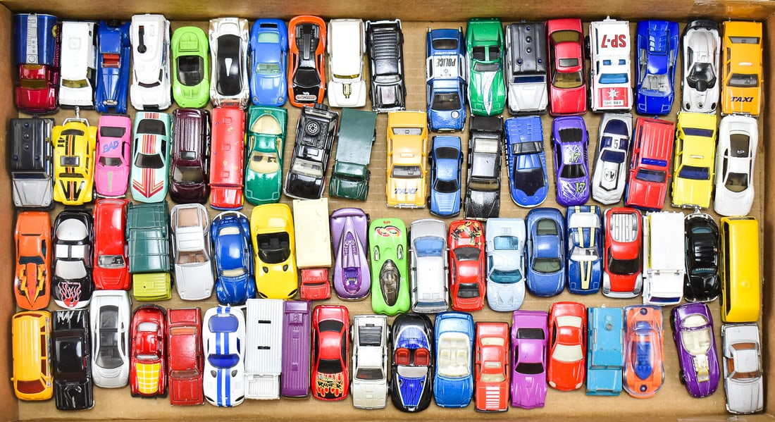 COLLECTION OF DIE-CAST TOY CARS: MATCHBOX, HOT WHEELS, MAISTO, & MORE: A collection of die-cast metal toy cars by various makers such as Matchbox, Hot Wheels, Maisto, etc. Most cars are c. 1980 through 2000 in age, and range in size from 2.5" to 3" L.