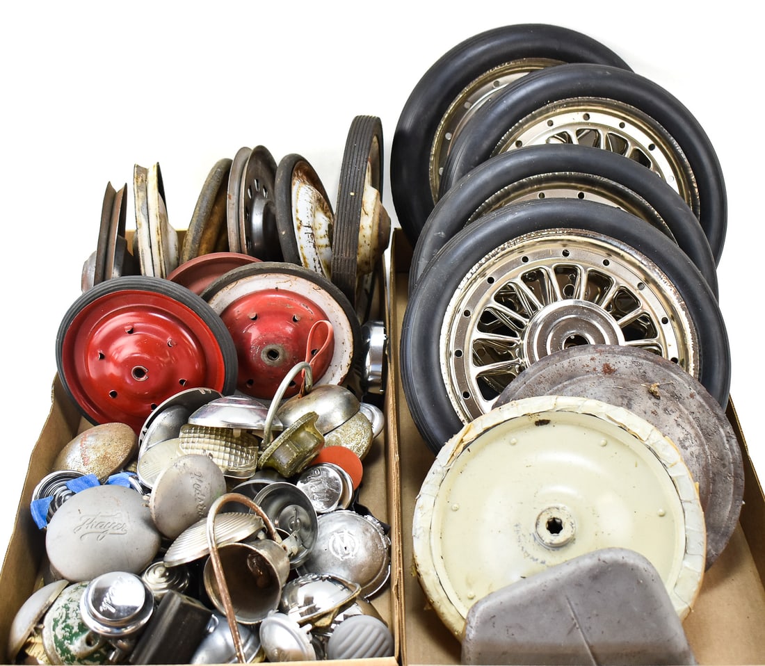 VINTAGE PEDAL CAR WHEELS, LIGHT CAPS, & BADGES: This lot includes vintage pedal car wheels, light caps, and badges. The brands include Welsh, Special, Thayer, and more. The largest item measures 13" H, 12" W, 2" D.