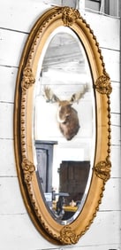 LARGE OVAL GOLD PAINTED MIRROR