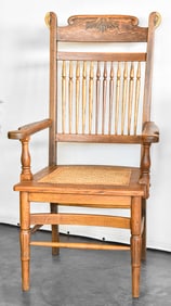 VICTORIAN OAK ARMCHAIR WITH CANE SEAT